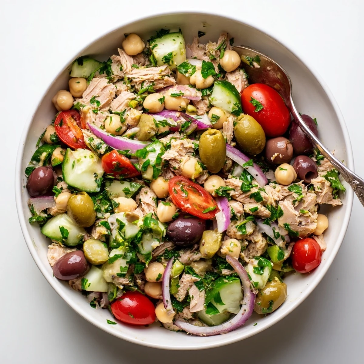 Golden tuna and creamy garbanzo beans tossed with crisp vegetables in zesty lemon dressing