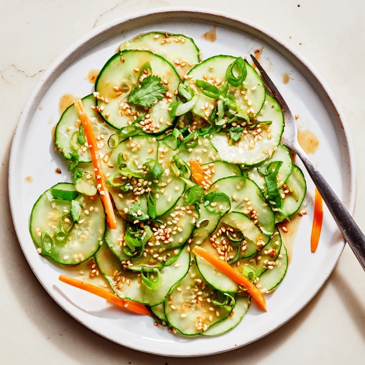 Vibrant bowl of crisp Asian cucumber salad marinated in savory sesame soy vinaigrette